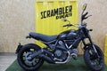 Ducati Scrambler icon: motorcycle side view, custom black color