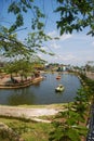 duck boats crossing an artificial lake