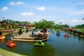 duck boats crossing an artificial lake