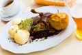 Duck with braised cabbage blue and yeast dumplings