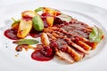 Duck Breast with Baked Apple and Peach Cream on Elegant Restaurant Plate