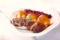 Duck breast with potato dumplings and red cabbage. Royalty Free Stock Photo