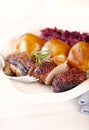 Duck breast with potato dumplings and red cabbage. Royalty Free Stock Photo