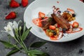 Duck breast with strawberry sauce. bon appetit. Duck breast, strawberry sauce, apple salsa with cinnamon, berries. top Royalty Free Stock Photo