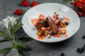 Duck breast with strawberry sauce. bon appetit. Duck breast, strawberry sauce, apple salsa with cinnamon, berries. top Royalty Free Stock Photo