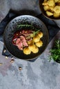 Duck breasts with Pommes Duchesse, cranberry sauce and pistachios Royalty Free Stock Photo