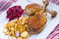 Duck confit with beetroots and jerusalem artichokes fries