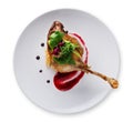 Duck confit with berry sauce isolated on white Royalty Free Stock Photo