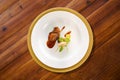 Duck dish on a wooden table