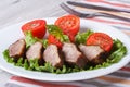 Duck meat fried with tomato and basil close-up horizontal Royalty Free Stock Photo