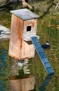 Duck nest wood box on the pond Royalty Free Stock Photo