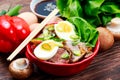 Duck noodles with egg and duck meat in bowl