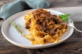 Duck ragout alla bolognese with pasta on a plate Royalty Free Stock Photo