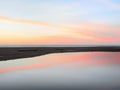 Duck and sundown over Pacific Ocean bay at Gold Bluffs Beach, Prairie Creek Redwoods State Park