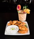 Duck Wings with Asian Dipping Sauce with Tiki Drink Royalty Free Stock Photo