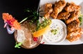 Duck wings with Tiki drink Royalty Free Stock Photo