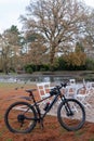 Duckpond at Pinner Memorial Park in the London suburbs, taken on a cold winter`s day. Bicycle in the foreground. Royalty Free Stock Photo