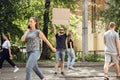 Dude with sign - man stands protesting things that annoy him