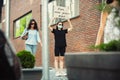 Dude with sign - woman stands protesting things that annoy him