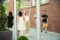 Dude with sign - woman stands protesting things that annoy him