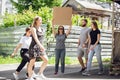 Dude with sign - woman stands protesting things that annoy her