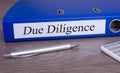 Due Diligence binder in the office Royalty Free Stock Photo
