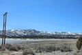 Looking Across Baker Pond To Snow Capped Mountains