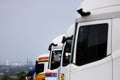 modern trucks weiting in a row Royalty Free Stock Photo