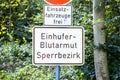 Duesseldorf , Germany - October 05 2017: Sign warning of of the infectious equine anaemia EIA . Translation: Equine