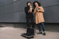 duet of street musicians playing trumpet