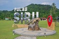 The dugong sanctuary statue platform located at a field in Kampung Duku village at Pulau Sibu Island, Johor, Malaysia Royalty Free Stock Photo