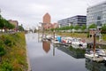 DUISBURG, GERMANY - JUNE 10, 2022: Inner harbor of Duisburg with the buildings of Mitsubishi, Hitachi, TK Gesundheit and the State