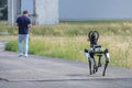 Duisburg, Germany, June 25, 2022: Police dog robot in test following the man with the remote control, Robo Dogs could be used in