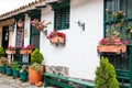 Beautiful facades of the houses at the touristic place called Pueblito Boyacense located in Royalty Free Stock Photo