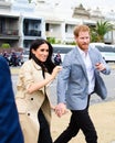 Prince Harry and Meghan holding hands while visiting Australia Royalty Free Stock Photo