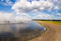 Dukora Belarus Minsk Region. Thermal energy electricity station plant cooling system fountains and lake in sunny summer