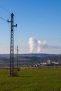 Dukovany nuclear power plant in the Czech Republic, Europe. Smoke cooling towers. There are clouds in the sky. In the foreground Royalty Free Stock Photo