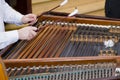 Man singing at his dulcimer 