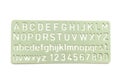 A dull green plastric stencil of the English alphabets letters Royalty Free Stock Photo