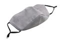 A dull light grey cotton face mask with black elastic rubber secure bands