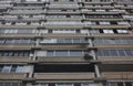 Dull panel asian building from below. Inhabited megapolis