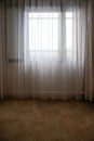 Dull sky view from a empty room with closed curtain Royalty Free Stock Photo