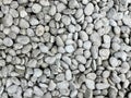 Dull White Pebbles Texture. Top View Of Natural Pebble Stone Royalty Free Stock Photo