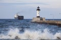 Duluth N Pier Lighthouse & Ship Royalty Free Stock Photo