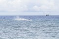 Dumaguete, Philippines - 13 May 2017: sea landscape with boats and local sailors.