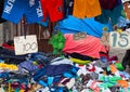 Dumaguete, Philippines - 9 September, 2017: Cheap clothes on rustic street market. Streetwear for sale.
