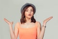 Dumb looking woman arms out shrugs shoulders Royalty Free Stock Photo