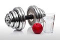 Dumbbell, apple and cup