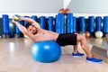 Dumbbell Bench Press On Fit Ball Man Gym Workout
