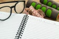 Dumbbell,measuring tape, glasses with diary book Royalty Free Stock Photo